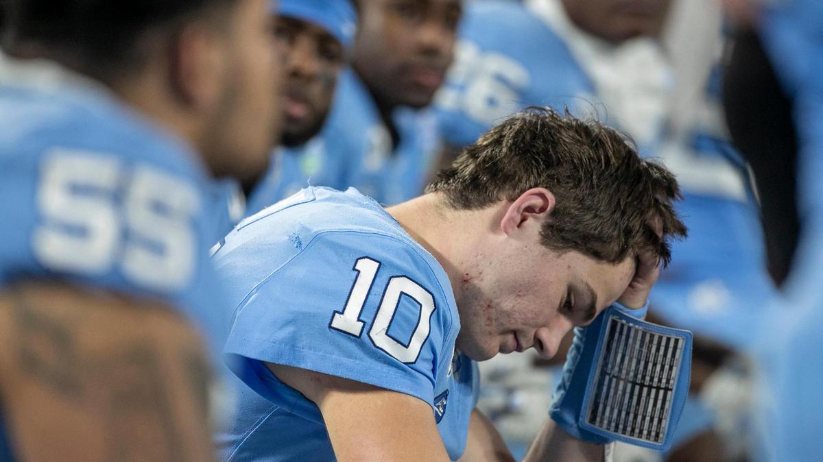 North Carolina quarterback Drake Maye (10) reacts on the bench after throwing his second interception of the game, during the ACC Championship game on Saturday, December 3, 2022 at Bank of American Stadium in Charlotte, N.C.
