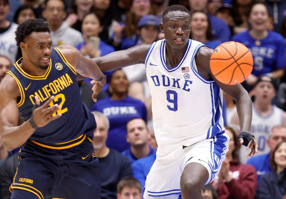 Duke’s Khaman Maluach (9) and California’s Mady Sissoko (12) go after the ball during the first half of Duke’s game against Cal at Cameron Indoor Stadium in Durham, N.C., Wednesday, Feb. 12, 2025.