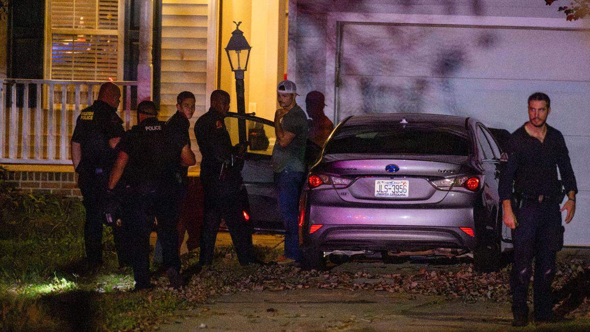 Raleigh Police work the scene where two “persons of interest” were detained Thursday afternoon on Kentford Court in Raleigh Thursday, Nov. 7, 2024. Raleigh police are investigating shots fired into eight cars and four houses, a growing total in the recent series of rush-hour shootings along Interstate 40 and near I-440.