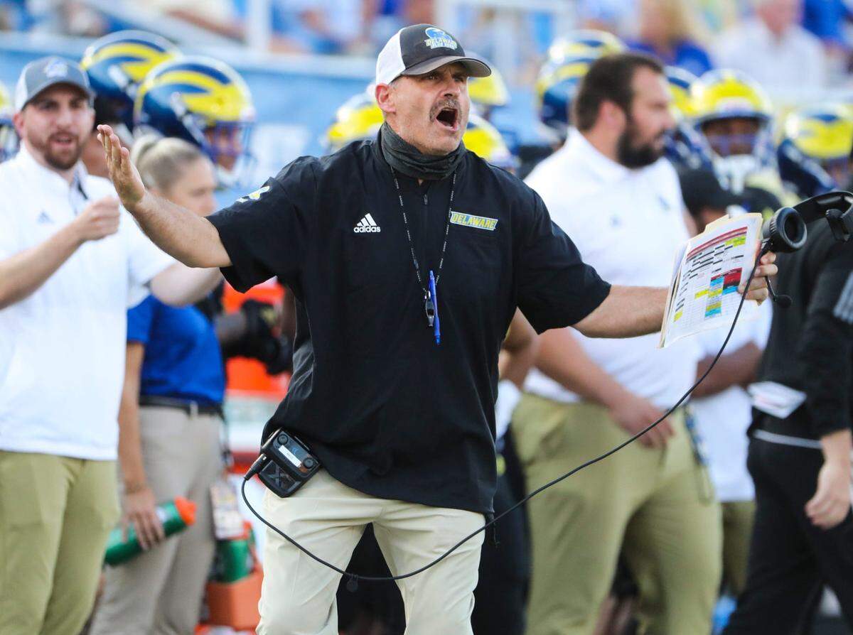 Delaware head coach Danny Rocco protests during a game at St. Francis at Delaware Stadium in September 2021. Rocco is now the head coach at VMI.