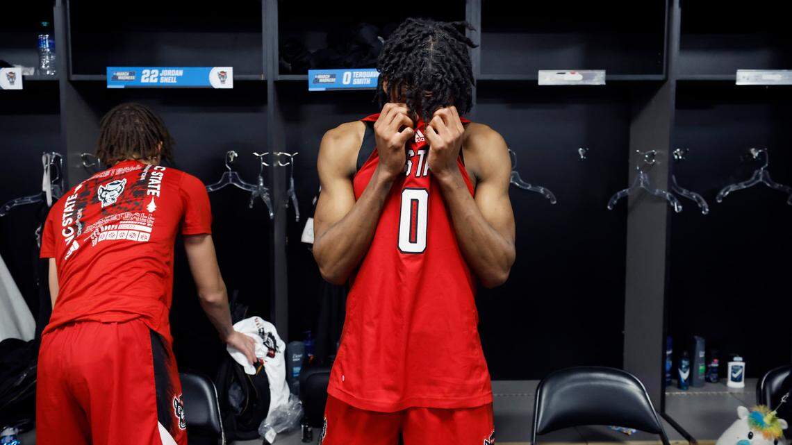 N.C. State’s Terquavion Smith (0) stands in front of his locker after Creighton’s 72-63 victory over N.C. State in the first round of the NCAA Tournament at Ball Arena in Denver, Colo., Friday, March 17, 2023.
