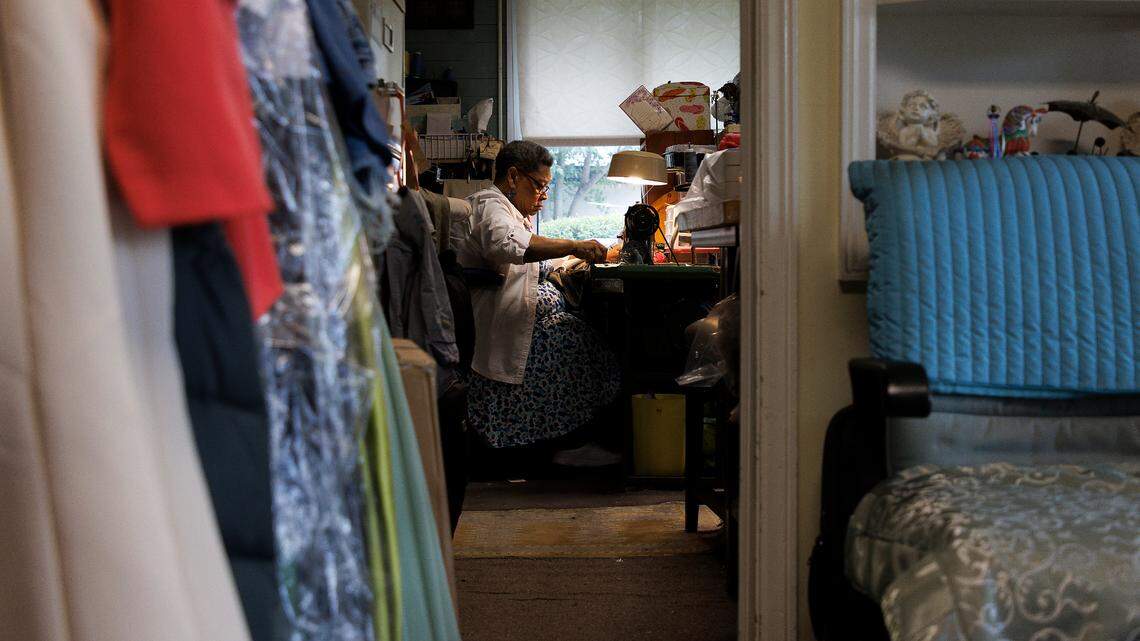 Linda Laws, owner of Stitches Tailor Shop, works at the shop on Monday, July 15, 2024, in Durham, N.C. After 28 years at its current location on Hillsborough Road, Laws is preparing to relocate the business.