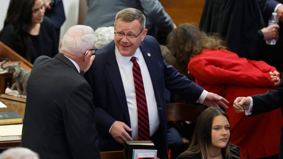 Speaker of the House Tim Moore talks with Rep. George Cleveland before the opening session of the N.C. House of Representatives Wednesday, Jan. 11, 2023.