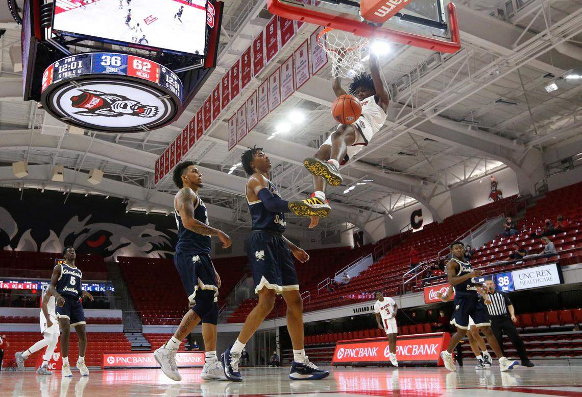 N.C. State’s Dereon Seabron (1) slams in two during N.C. State’s 95-61 victory over Charleston Southern in the Wolfpack Invitational at Reynolds Coliseum in Raleigh, N.C., Wednesday, Nov. 25, 2020.