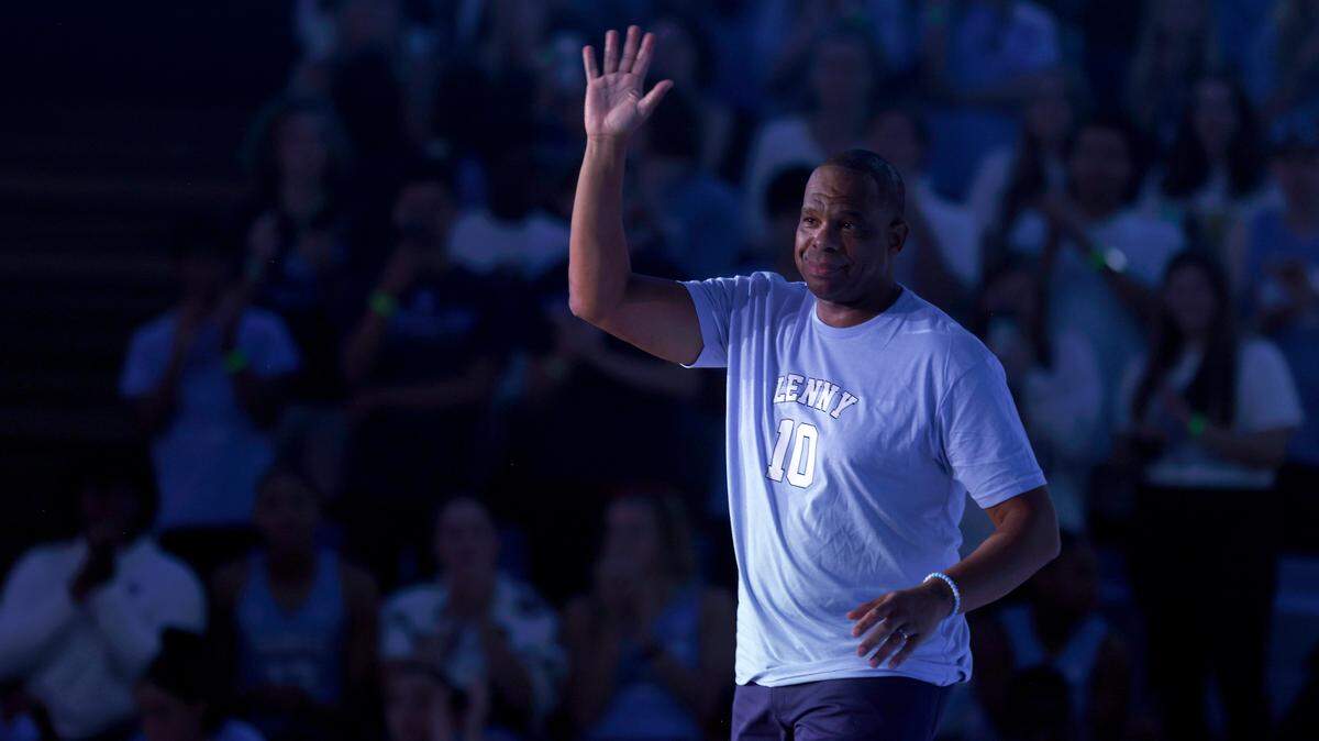 North Carolina men’s basketball head coach Hubert Davis waves to the crowd during “Live Action with Carolina Basketball” at the Dean E. Smith Center on Friday, Oct. 7, 2022, in Chapel Hill, N.C.