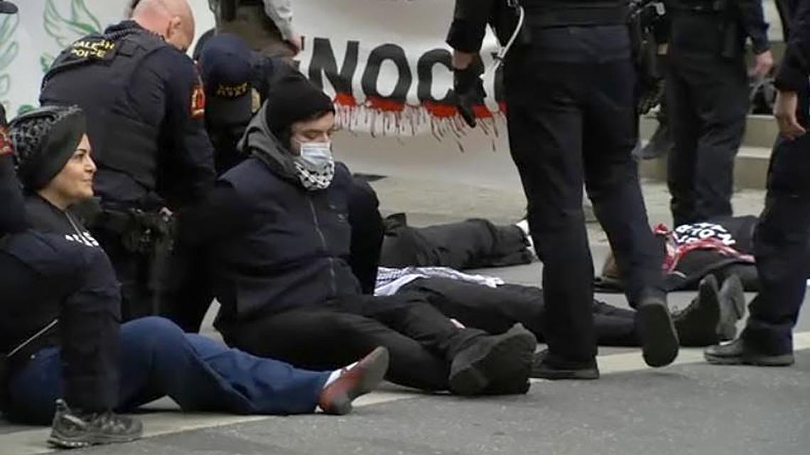 Demonstrators seeking a cease-fire in the Israel-Hamas war blocked part of Fayetteville Street in downtown Raleigh late Thursday afternoon.