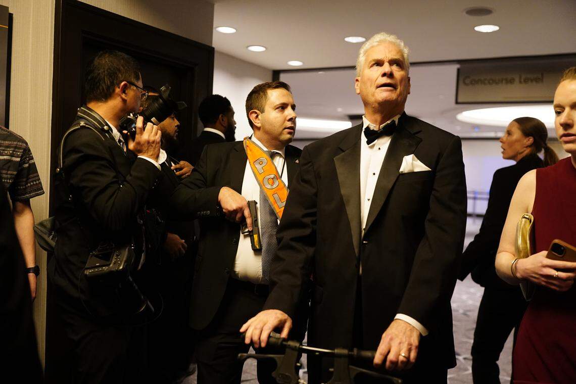 Agents escort people out of the Washington Hilton after an incident at the annual White House Correspondents Association Dinner April 25, 2026 in Washington, DC. The president is making his first appearance at the event which he has shunned from in the past.