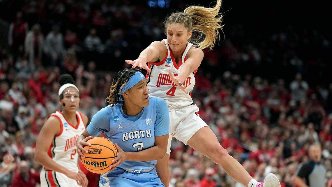 Ohio State Buckeyes guard Jacy Sheldon (4) tries to steal the ball from North Carolina Tar Heels guard Kennedy Todd-Williams (3) during the first quarter of their NCAA second round game at at Value City Arena.