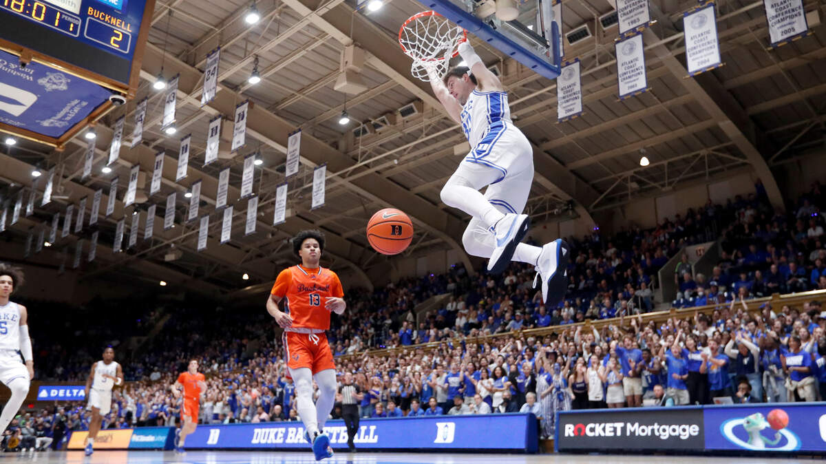 Duke’s Kyle Filipowski (30) slams in two during Duke’s 90-60 victory over Bucknell at Cameron Indoor Stadium in Durham, N.C., Friday, Nov. 17, 2023.