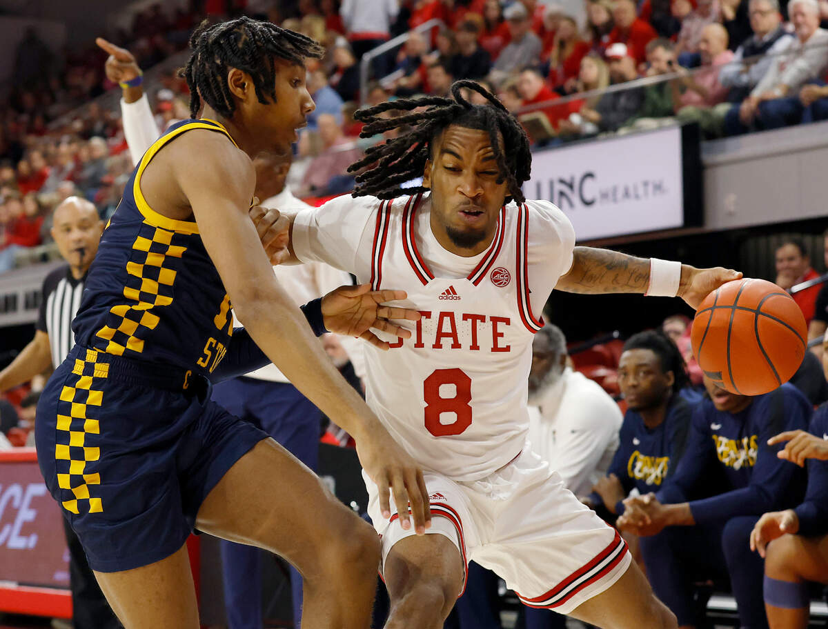 N.C. State’s Jayden Taylor drives the baseline during the first half of the Wolfpack’s game against Coppin State on Tuesday, Dec. 10, 2024, at Reynolds Coliseum in Raleigh, N.C.