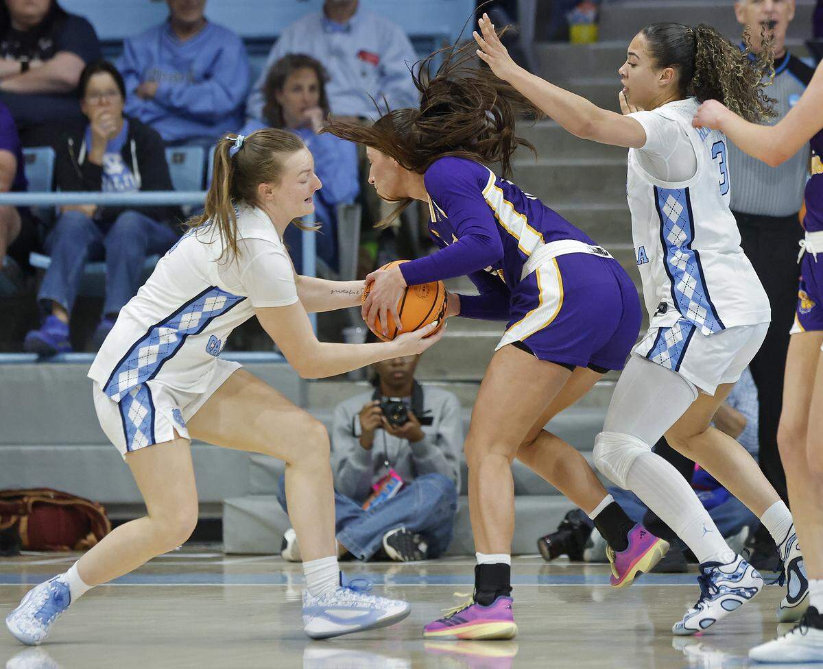 North Carolina’s Jordan Zubich fights for possession with Western Illinois’ Mallory Shetley during the second half of the Tar Heels’ 82-51 first-round NCAA Tournament win on Friday, March 20, 2026, at Carmichael Arena in Chapel Hill, N.C.