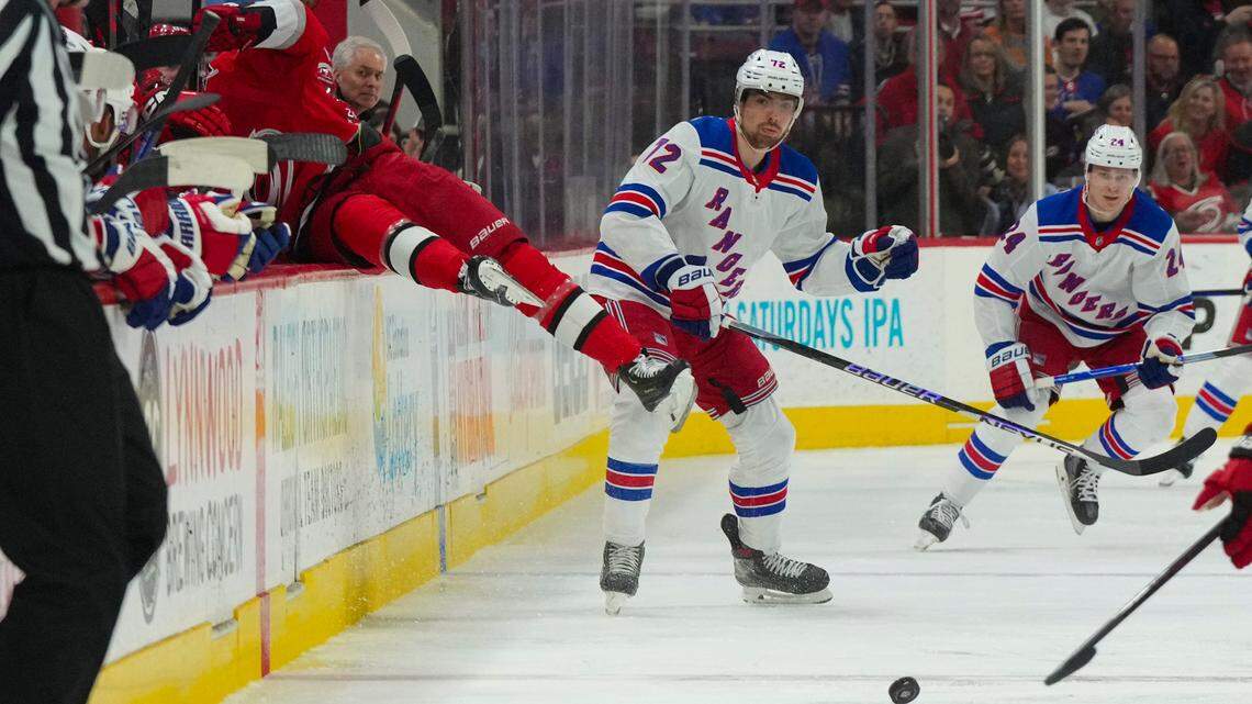 New York Rangers center Filip Chytil (72) checks Carolina Hurricanes center Jesperi Kotkaniemi (82) during the second period of the Rangers’ 2-1 win Thursday at PNC Arena.