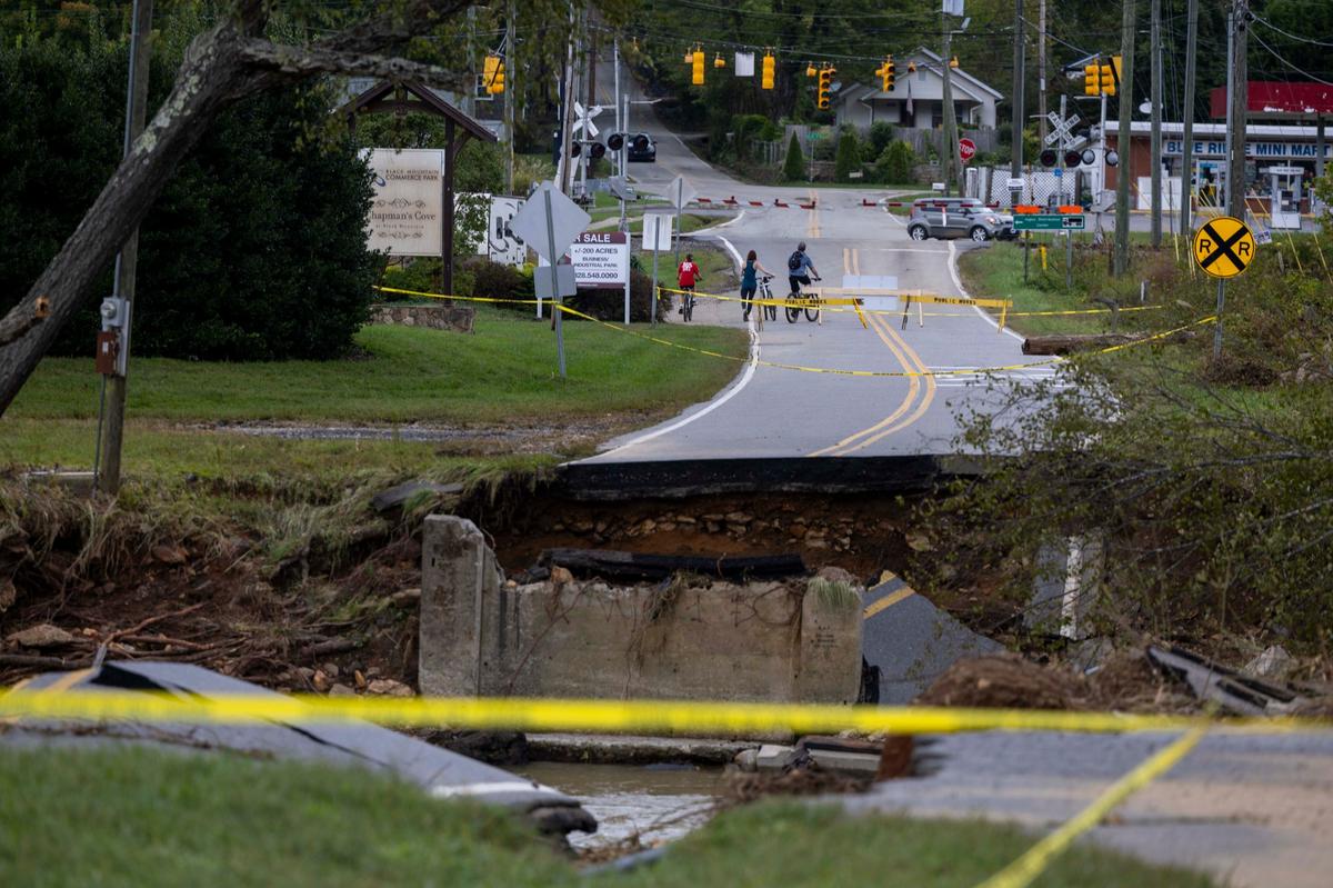 A washed out bridge over the Swannanoa River in Black Mountain on Sunday, Sept. 29, 2024. The remnants of Hurricane Helene caused widespread flooding, downed trees, and power outages in western North Carolina.