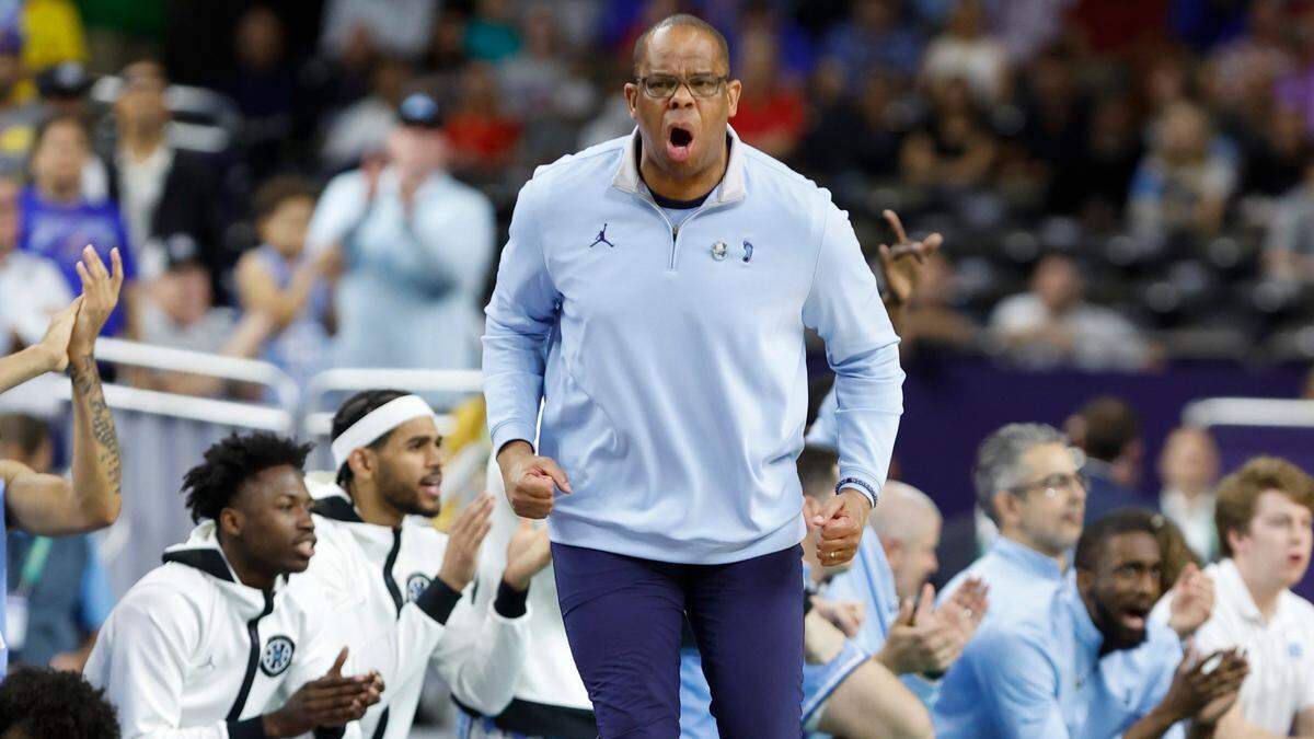 North Carolina head coach Hubert Davis is pumped during the first half of UNCís game against Kansas in the NCAA Menís National Championship at the Caesars Superdome in New Orleans, La., Monday, April 4, 2022.