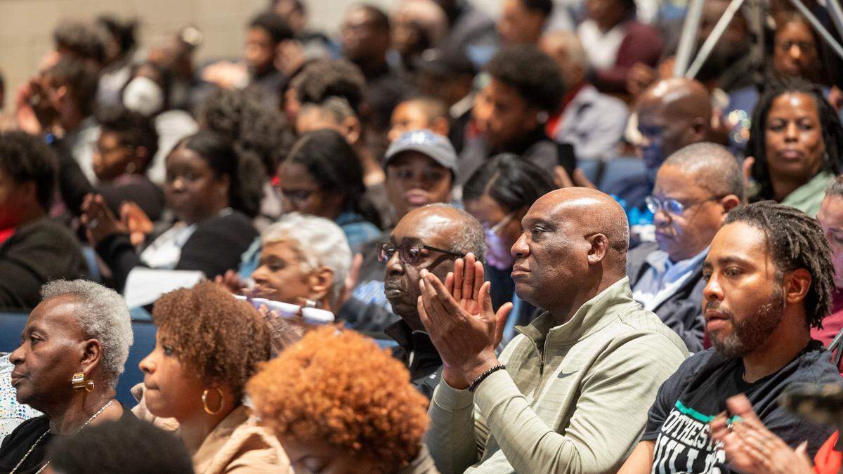 Community members fill the auditorium at Southeast Raleigh High School during a community forum Monday, Dec. 4, 2023, one week after a brawl resulted in the fatal stabbing of a 15-year-old student and the wounding of a 16-year-old.