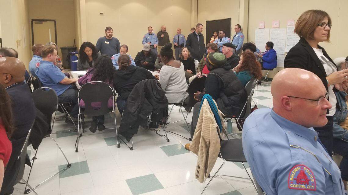 Community members and Raleigh Police officers discuss a potential police oversight board at Chavis Community Center on Nov. 20, 2019.