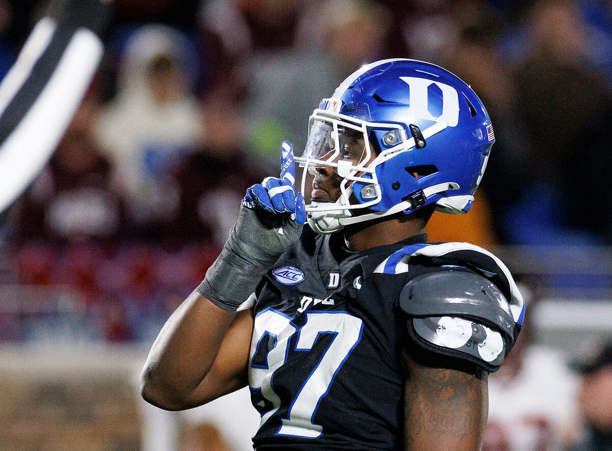Duke’s Wesley Williams motions to the crowd after sacking Virginia Tech quarterback William Watson III during the first half of the Blue Devils’ game on Saturday, Nov. 23, 2024, at Wallace Wade Stadium in Durham, N.C.