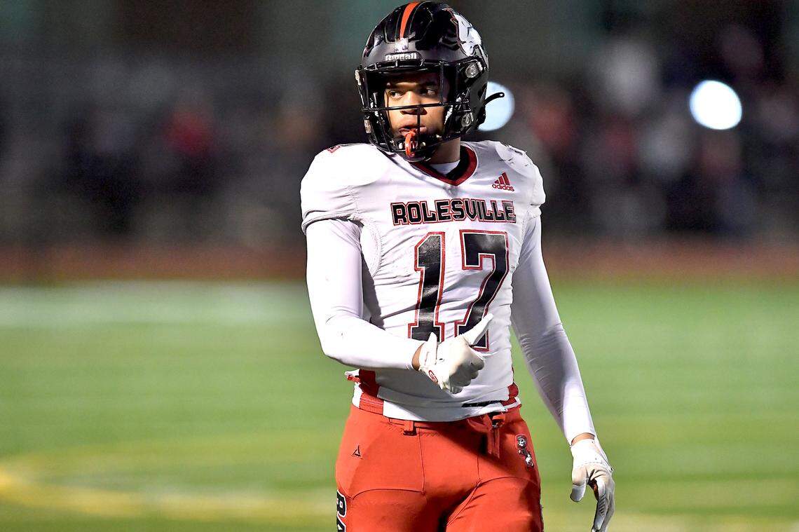 Rolesville wide receiver Jaedon Alford (17) gives the okay to the sideline referee before the start of the down against Cardinal Gibbons during the second half. The Rolesville Rams and the Cardinal Gibbons Crusaders met in the East Regional Final of the NCHSAA 4A football playoffs in Raleigh, N.C. on December 13, 2024.