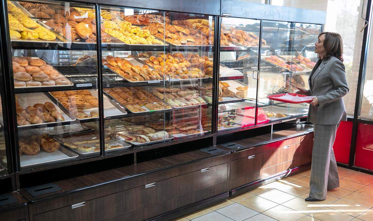 Vice President Kamala Harris scours the selection of baked goods during a visit to Panaderia Artisanal, a Latina-owned bakery on Monday, January 30, 2023 in Raleigh, N.C.