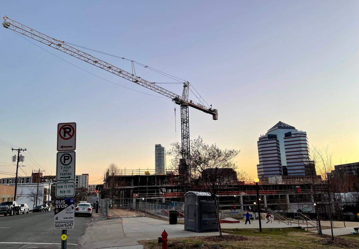 A crane rises over central Durham on February 10, 2022.