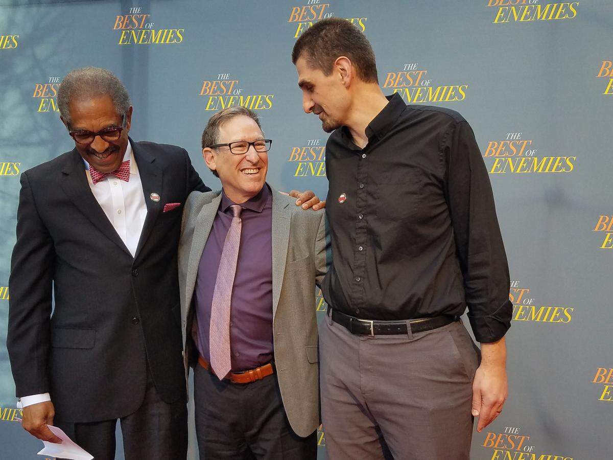 Benjamin Reese Jr., left, and Jonathan Wilson-Hartgrove, right, appear on the red carpet with author Osha Gray Davidson at the March 19, 2019, premiere of “The Best of Enemies” at the Carolina Theatre in Durham, N.C. Davidson’s book was source material for the film, starring Taraji P. Henson and Sam Rockwell. Reese and Wilson-Hartgrove helped bring the film premiere to Durham.