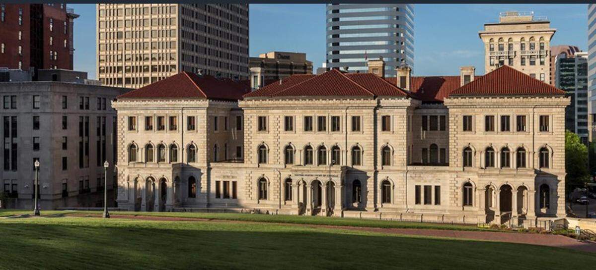 A photo of the Lewis F. Powell Jr. U.S. Courthouse and Annex for the U.S. Court of Appeals for the Fourth Circuit in Richmond, Virginia. The court decides on federal cases from North Carolina and surrounding states.