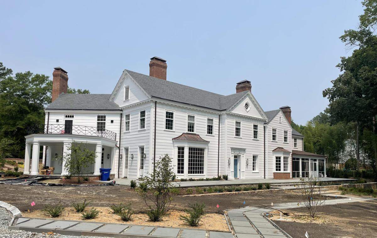 A 2023 photo of 1810 Cedar St. in Durham, former home of Michael Peterson, showing extensive renovations to the home and property.