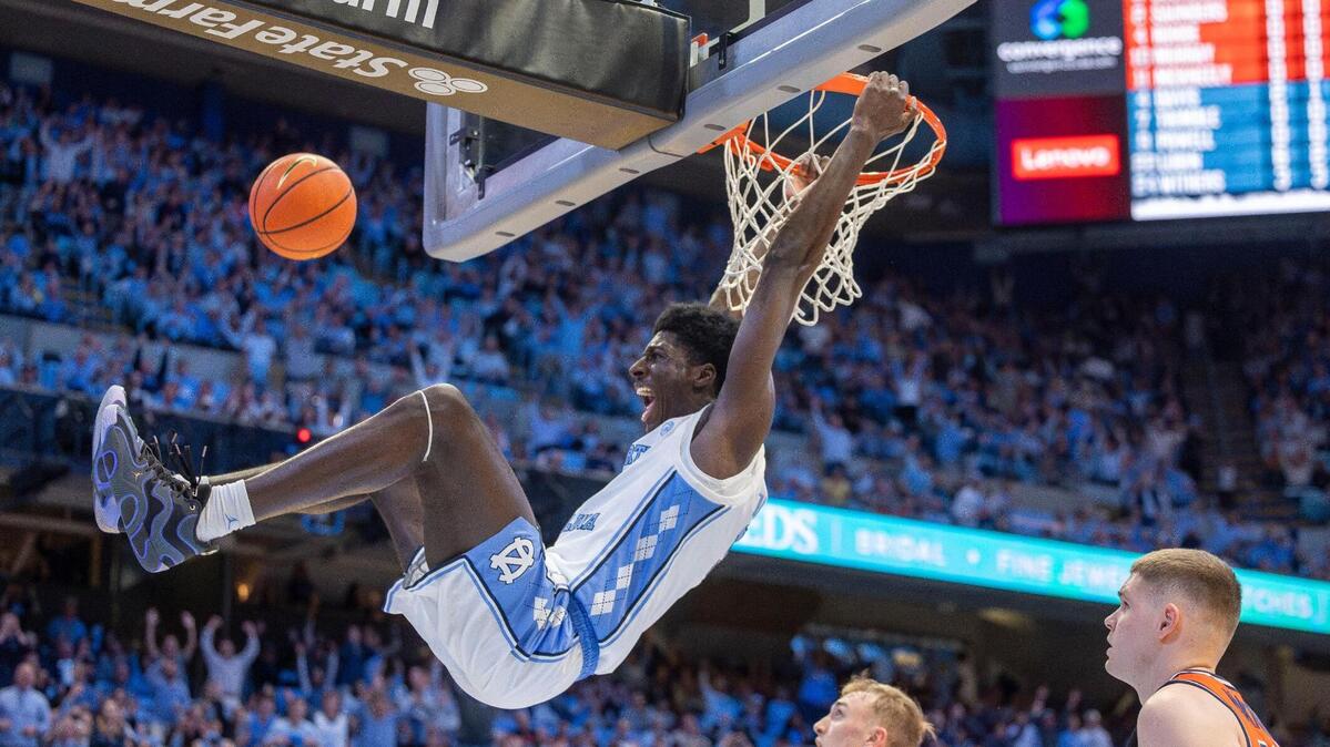 North Carolina forward Drake Powell (9) gets a dunk in the first half against Virginia on Saturday, February 22, 2025 at the Smith Center in Chapel Hill, N.C.