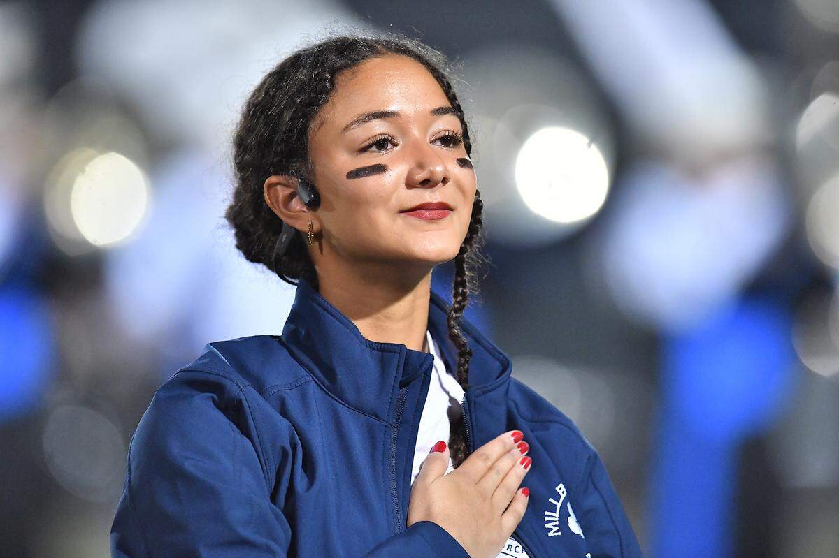 Millbrook band member during the national anthem before their game against Jordan. The Millbrook Wildcats and the Jordan Falcons met in the third round of the NCHSAA 8A football playoffs in Raleigh, N.C. on November 21, 2025. 
