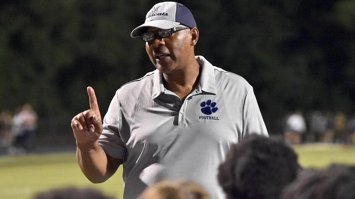 Millbrook Head Coach Jim Vereen talks to his team after their victory over Sanderson earlier this season. The Wildcats mounted a furious comeback Friday night against New Bern, but fell just short in the East regional final.