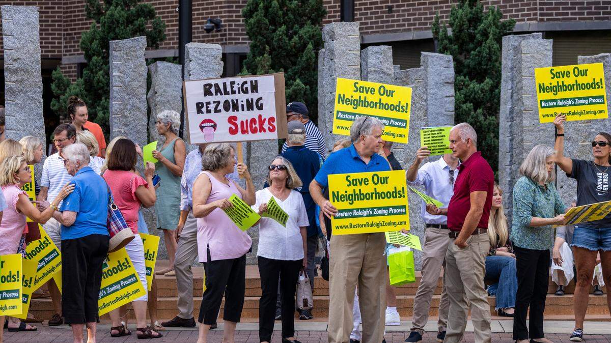 Demonstrators protest outside the Raleigh Municipal Building prior to a city council meeting Tuesday Sept. 6, 2022. Many of the demonstrators opposed recent amendments to Raleigh’s zoning ordinances.
