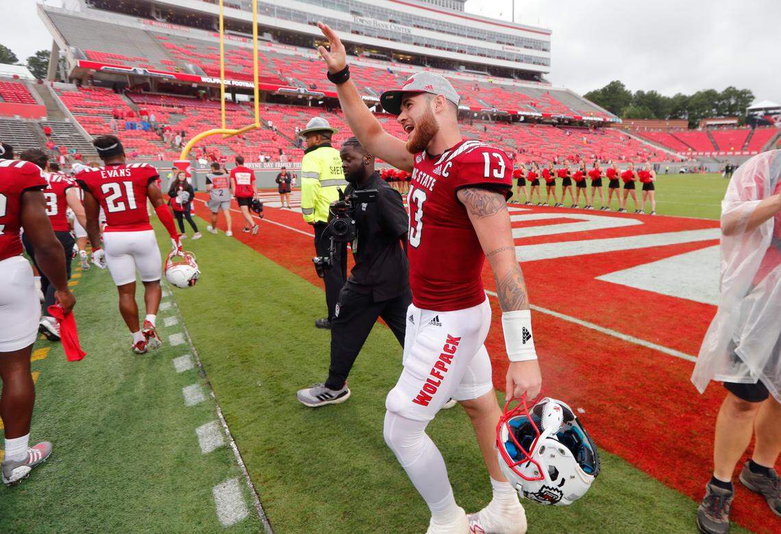 N.C. State quarterback Devin Leary (13) thanks the band after they sang happy birthday to him after N.C. State’s 55-3 victory over Charleston Southern at Carter-Finley Stadium in Raleigh, N.C., Saturday, Sept. 10, 2022.