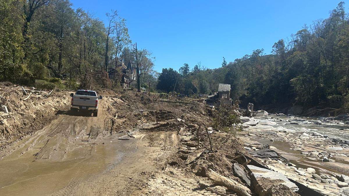 A pickup truck heads up an improvised trail where U.S. 64/74A was washed away in Bat Cave, North Carolina. Photo taken Oct. 10, 2024. A group of miners from West Virginia extended the trail down to Chimney Rock the week of Oct. 21.