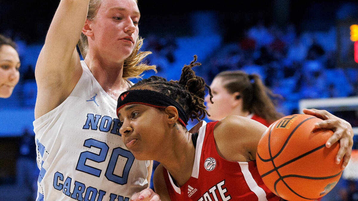 N.C. State’s Aziaha James drives against North Carolina’s Lexi Donarski during the second half of the Wolfpack’s 80-70 loss on Thursday, Feb. 22, 2024, at Carmichael Arena in Chapel Hill, N.C.