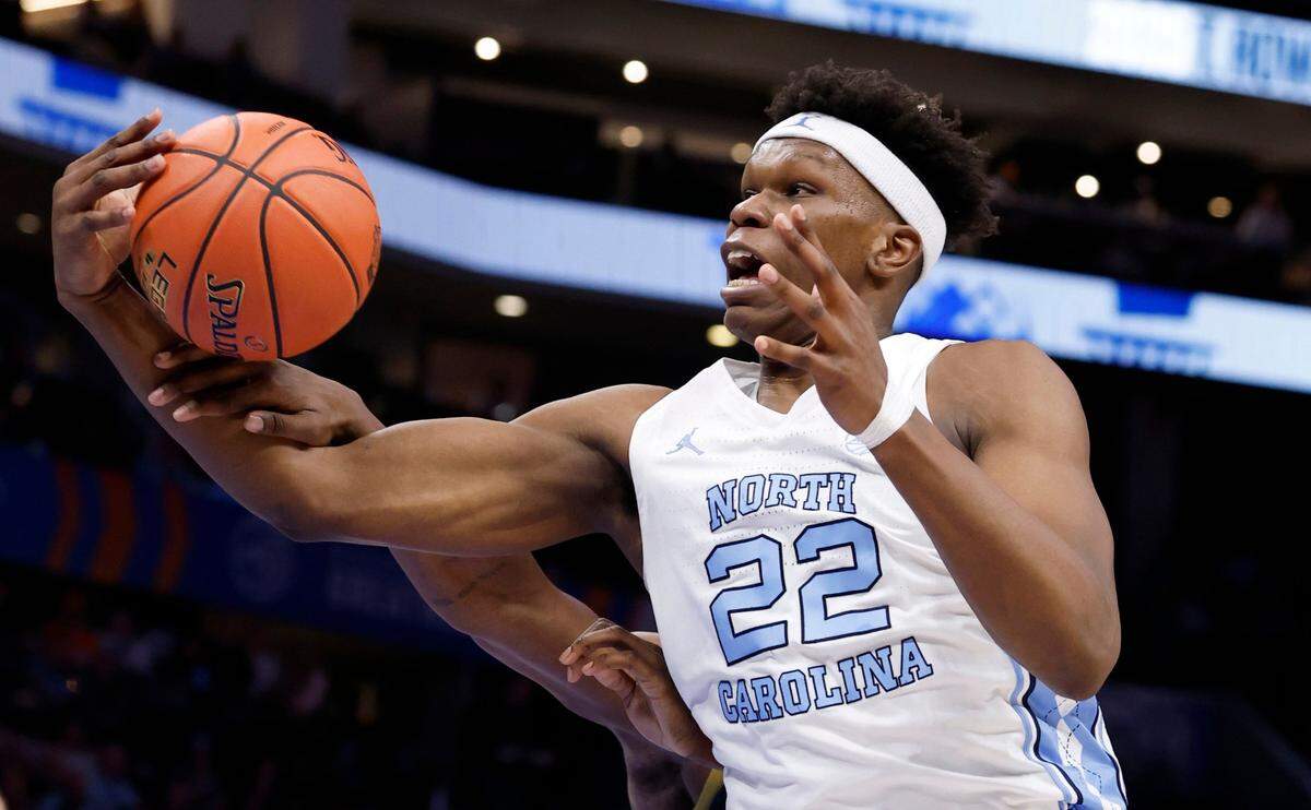 North Carolina’s Ven-Allen Lubin (22) pulls in the rebound during the first half of UNC’s game against Notre Dame in the second round 2025 of the ACC Men’s Basketball Tournament at the Spectrum Center in Charlotte, N.C., Wednesday, March 12, 2025.