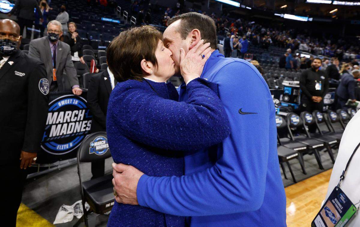 Duke head coach Mike Krzyzewski gets a kiss from his wife, Mickie, after Dukes 78-73 victory over Texas Tech in the Sweet 16 round of the NCAA Tournament at the Chase Center in San Francisco, Calif., Thursday, March 24, 2022.