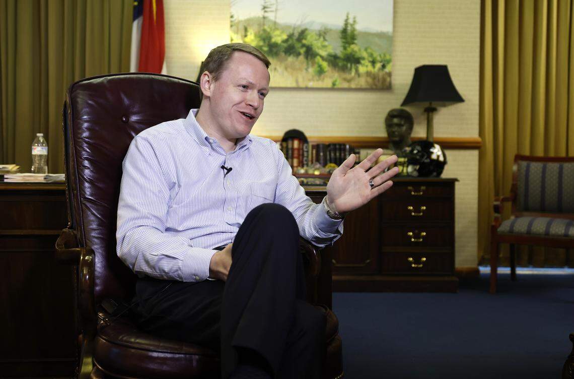 Republican House Speaker Destin Hall answers a question while being interviewed in his office in the Legislative Building in Raleigh, N.C., Wednesday, Nov. 19, 2025.