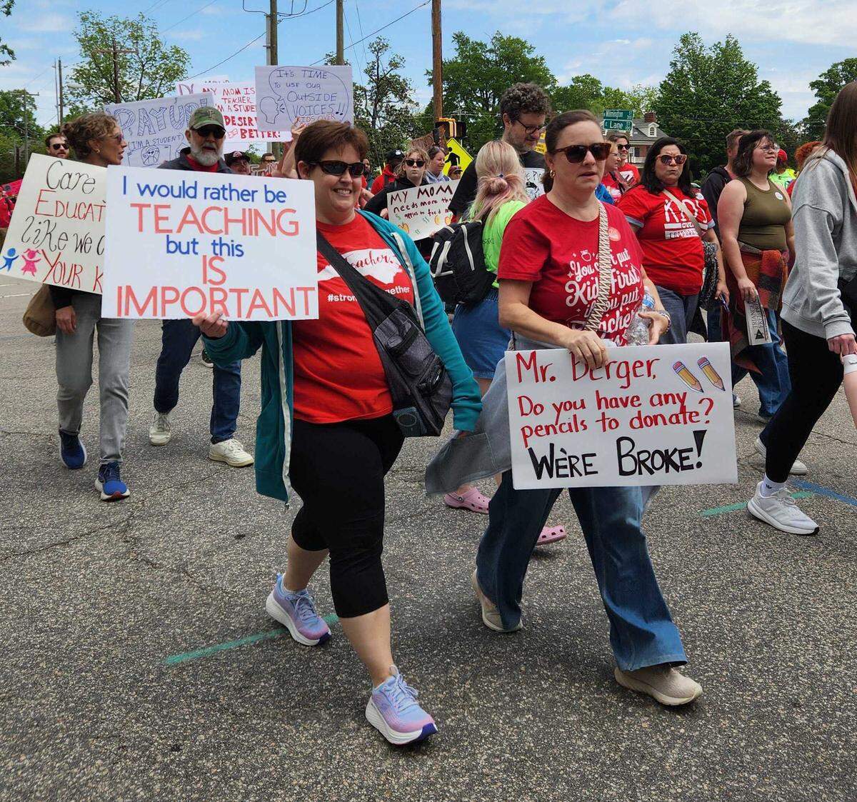 Protesters march in support of teachers and education funding in downtown Raleigh, Friday, May 1, 2026.