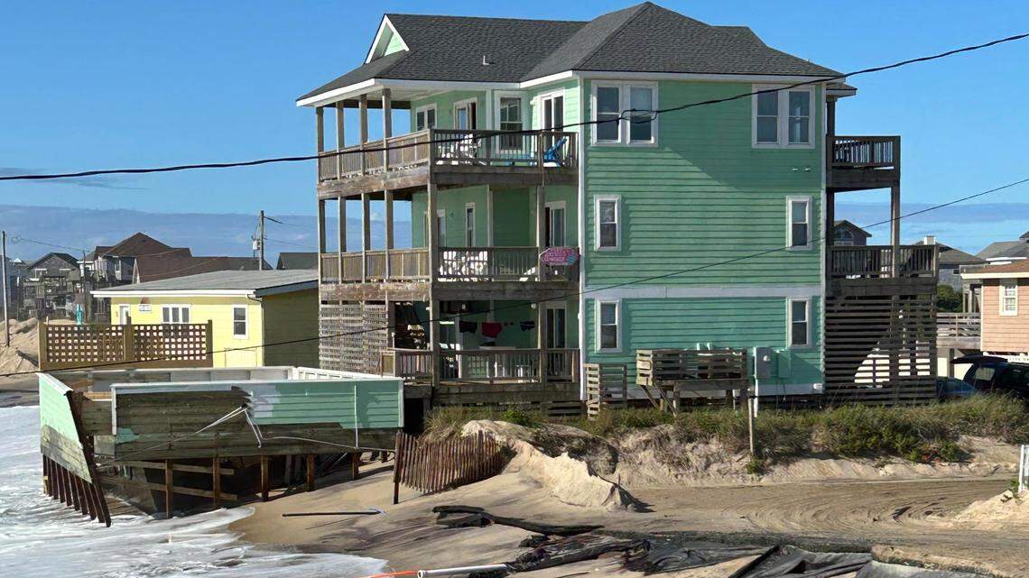 Hilary Graf’s beach house in Rodanthe, which is experiencing heavy erosion, but remains solid while she broadcasts her faith into the sea.