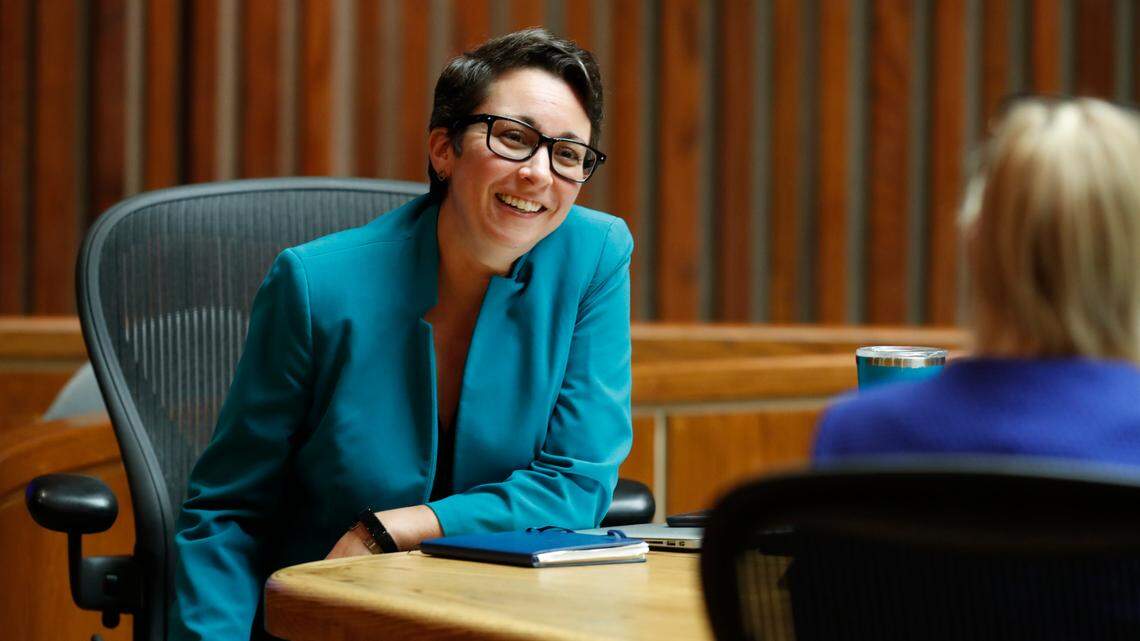 Raleigh council member Nicole Stewart talks with city attorney Robin Tatum before the Raleigh City Council meeting at the Municipal Building in Raleigh, N.C. Tuesday, June 15, 2021.
