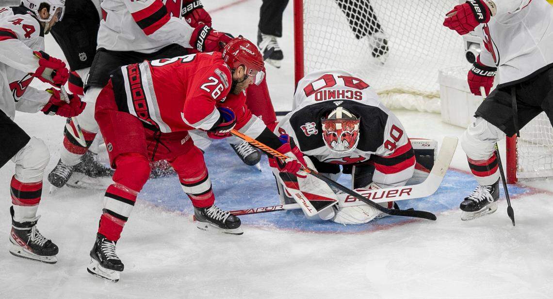 New Jersey Devils goalie Akira Schmid (40) stops a scoring attempt by the Carolina Hurricanes Paul Stastny (26) in the second period during Game 5 of their second round Stanley Cup playoff series on Thursday, May 11, 2023 at PNC Arena in Raleigh, N.C.