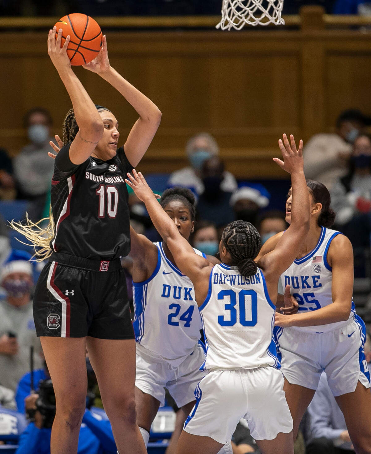 South Carolina’s Kamilla Cardoso (10) secures an offensive rebound over Duke’s Onome Akinbode-James (24), Shayeann Day-Wilson (30) and Jade Williams (25) on Wednesday, December 15, 2021 at Cameron Indoor Stadium in Durham, N.C.