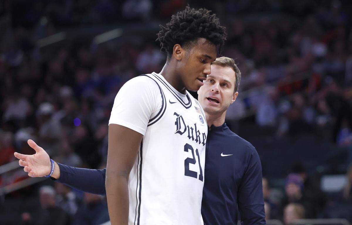 Duke head coach Jon Scheyer talks to Patrick Ngongba II during the second half of Texas Tech’s 82-81 victory over Duke in the SentinelOne Classic at Madison Square Garden in New York City on Dec. 20. 