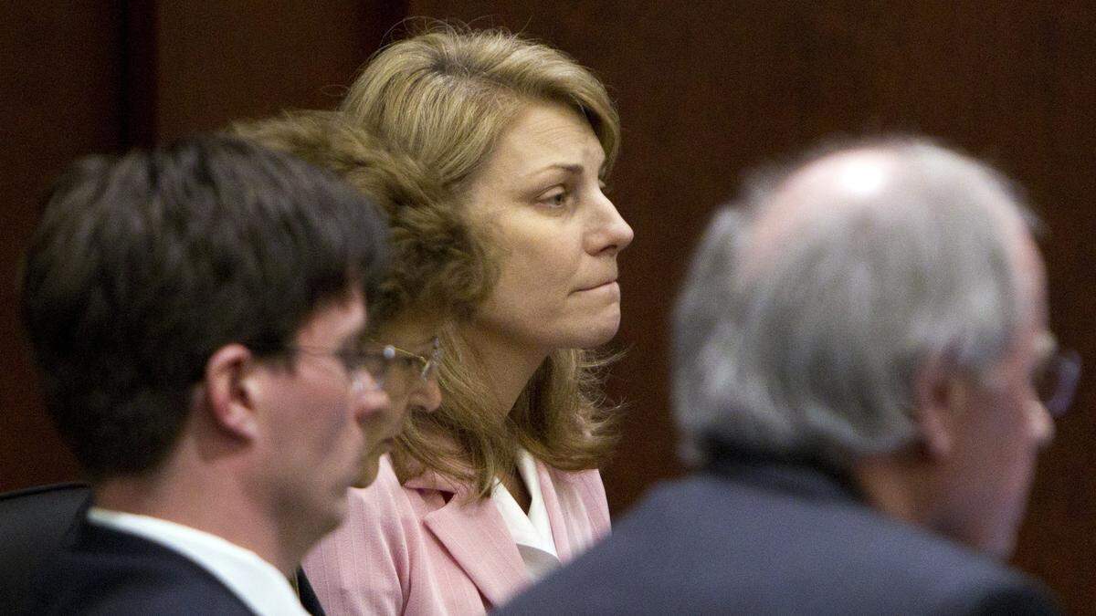 A stoic Amanda Hayes (right) listens as she hears the jury’s verdict finding her of guilty of second degree murder Wednesday, Feb. 19, 2014. Hayes was accused of acting in concert with her husband to kill the mother of his stepsons ad was on trial for nearly three weeks, accused of acting in concert with her husband, Grant Hayes, to murder and dismember Laura Jean Ackerson in July 2011.