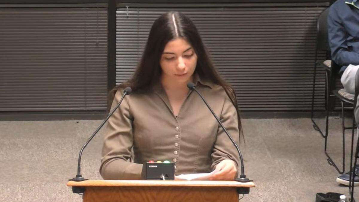 Lorena Benson, 15, a sophomore at Athens Drive High School, tells the Wake County school board on Sept. 17, 2024 that she was outraged to have a class reading assignment about two cousins who had a sexual relationship.