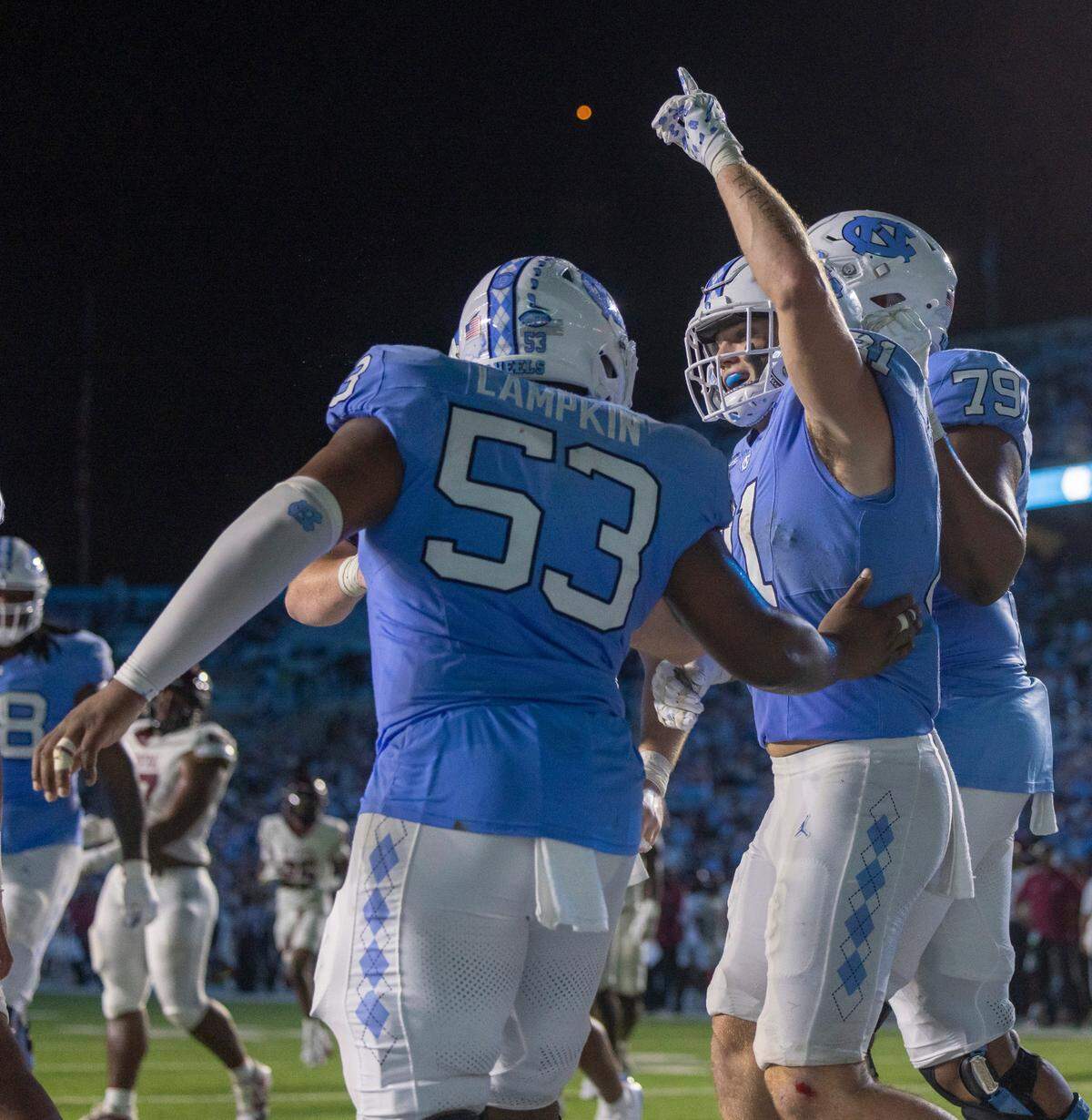North Carolina tight end John Copenhaver (81) celebrates after scoring a touchdown on a 23-yard pass reception from quarterback Jacolby Criswell in the fourth quarter against N.C. Central on Saturday, September 14, 2024 at Kenan Stadium in Chapel Hill, N.C.