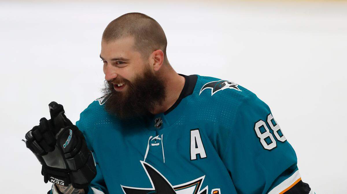 San Jose Sharks defenseman Brent Burns gestures as players warm up for an NHL hockey game against the Anaheim Ducks in San Jose, Calif., Saturday, March 26, 2022. (AP Photo/Josie Lepe)