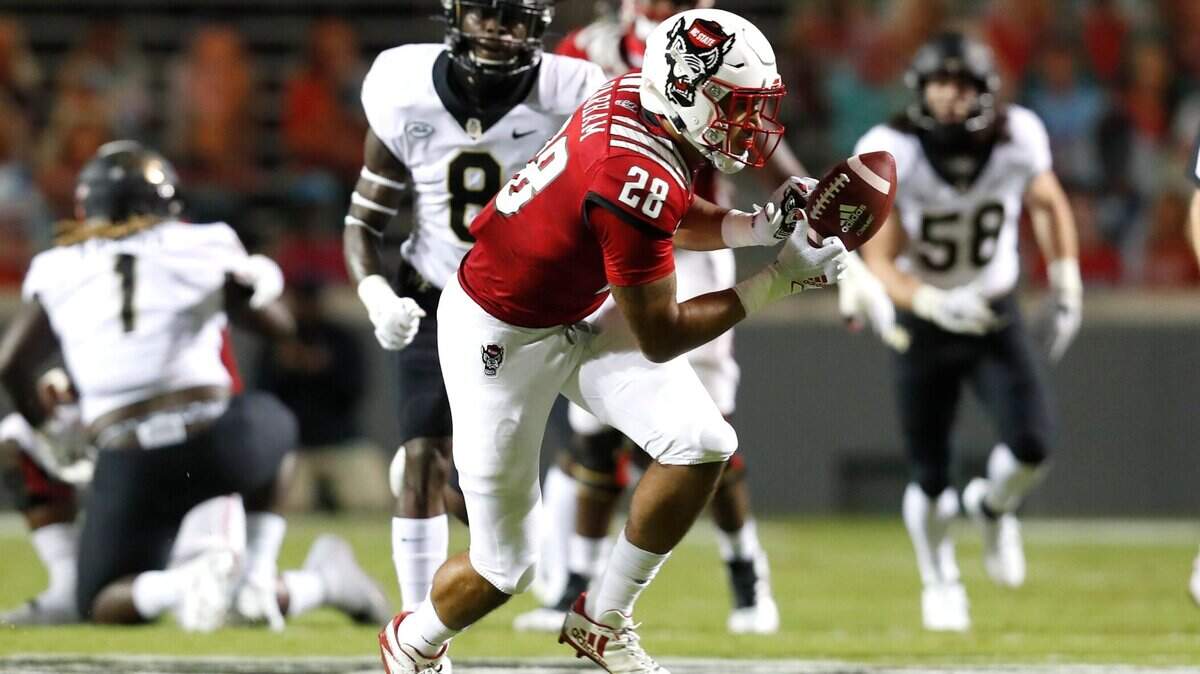 N.C. State tight end Dylan Parham (28) pulls in a reception during the first half of N.C. State’s game against Wake Forest at Carter-Finley Stadium in Raleigh, N.C, Saturday, Sept. 19, 2020.