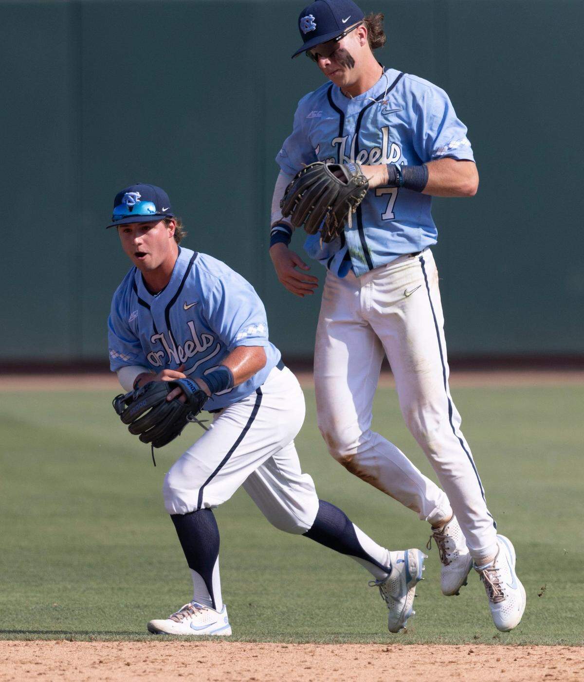 North Carolinas Patrick Alvarez (8) and Vance Honeycutt (7) react after a diving catch by Honeycutt on a long ball by Arkansas Brady Slavens in the seventh inning, preventing a go ahead run from scoring in game two of their NCAA Super Regional series on Sunday, June 12, 2022 at Boshamer Stadium in Chapel Hill, N.C.