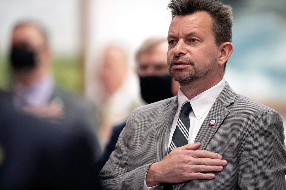 Rep. Timothy Moffitt of Hendersonville, N.C. recites the Pledge of Allegiance as the House begins their session on Wednesday, January 27, 2021 in Raleigh N.C.